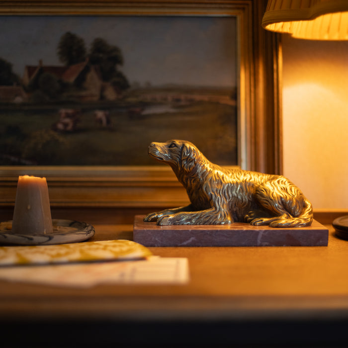 A 19th Century Gilt Bronze Study of a Reclining Labrador Dog on a Rouge Marble Base