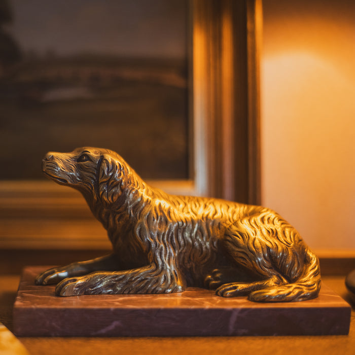 A 19th Century Gilt Bronze Study of a Reclining Labrador Dog on a Rouge Marble Base
