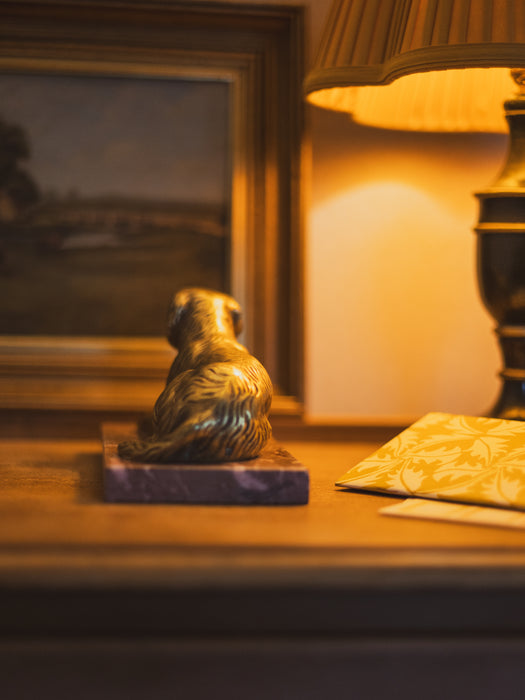A 19th Century Gilt Bronze Study of a Reclining Labrador Dog on a Rouge Marble Base