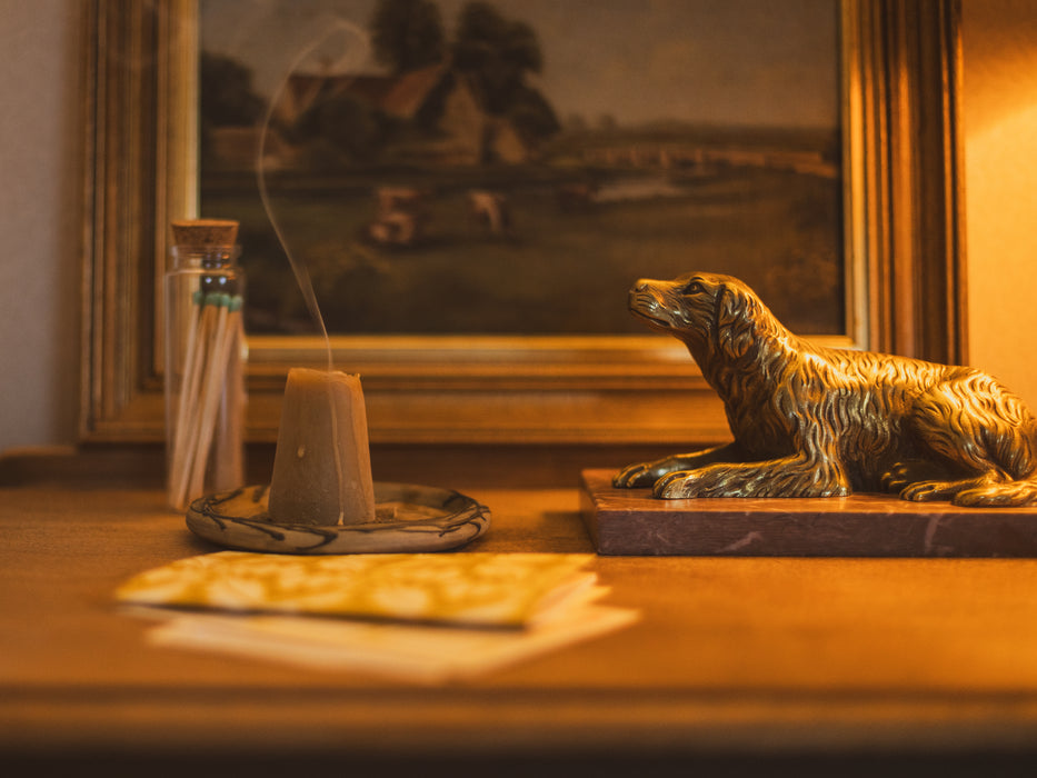 A 19th Century Gilt Bronze Study of a Reclining Labrador Dog on a Rouge Marble Base