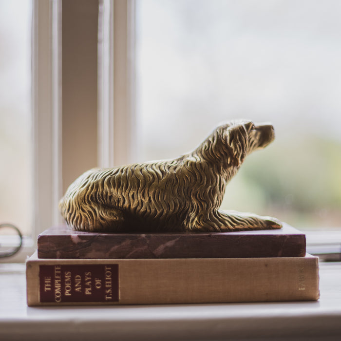 A 19th Century Gilt Bronze Study of a Reclining Labrador Dog on a Rouge Marble Base